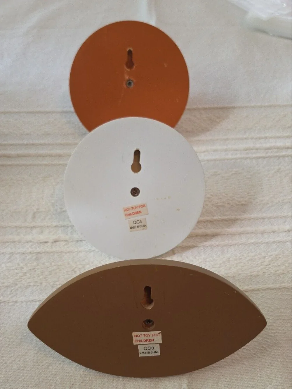 Decorative sports ball wood wall hooks for themed kids' rooms